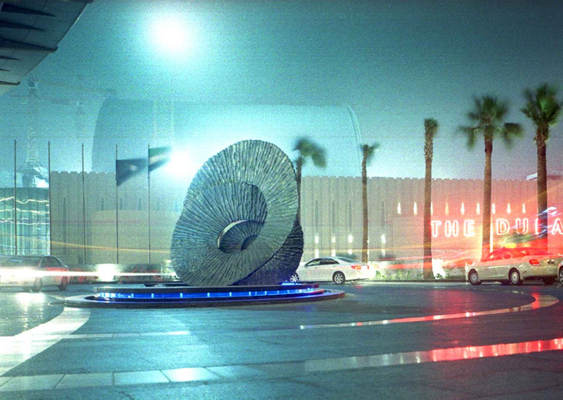 Concha by night with Dubai Mall in the background by The Address, Dubai