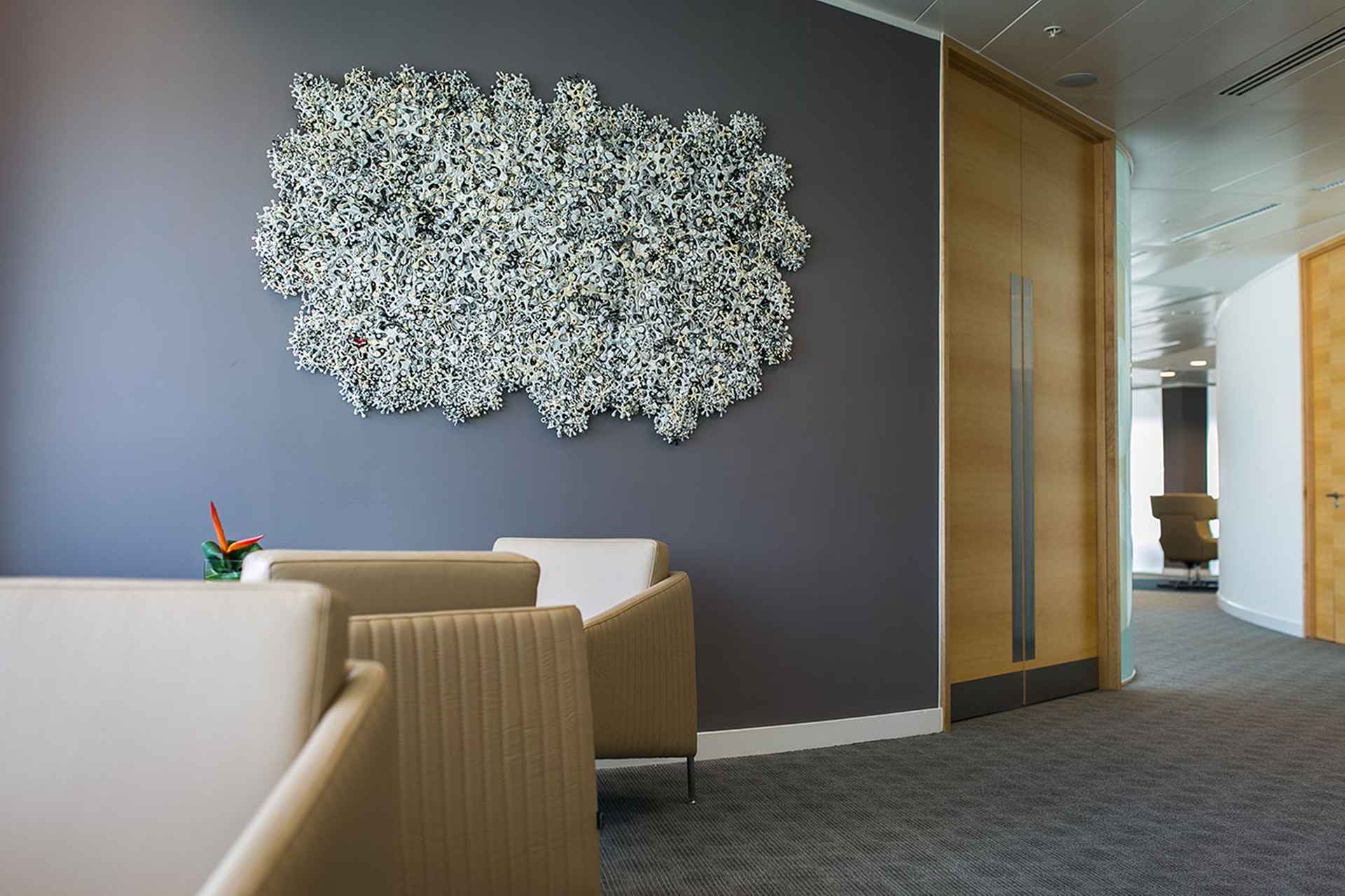 Tactile, specially commissioned, wall mounted sculpture by Stephen Farley by TLT Solicitors